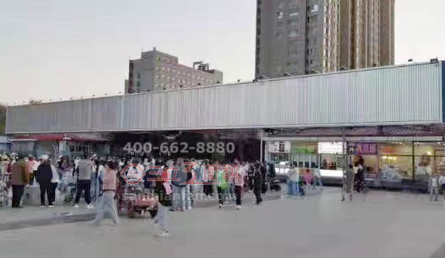 河北省張家口市蔚縣廣場(chǎng)三面翻屋頂廣告牌案例施工圖片